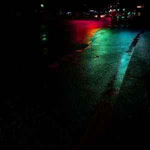 Rain, Neon, and Night: Low‑Light Travel Photography